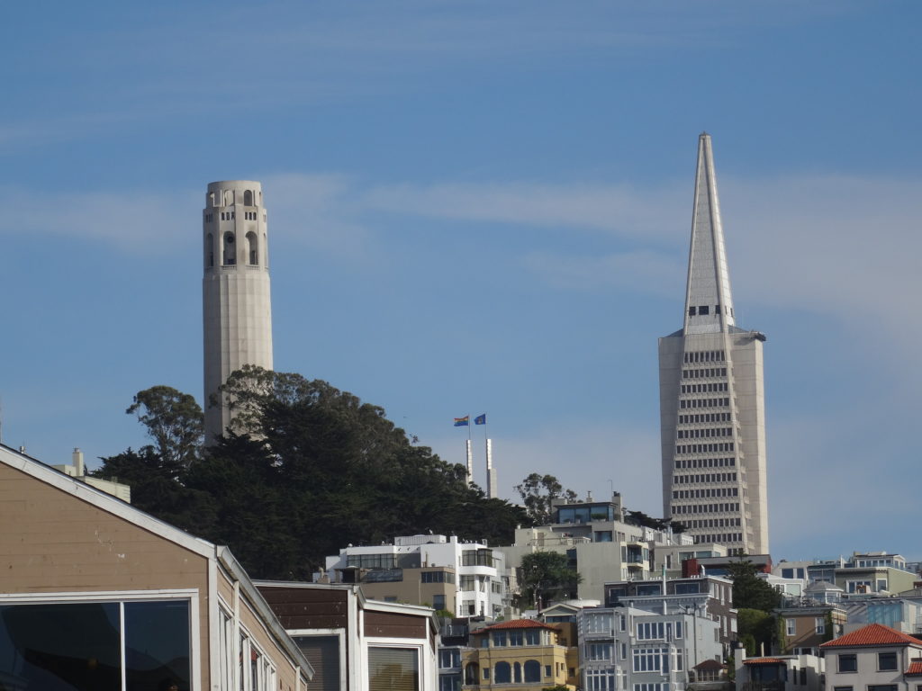 Coit Tower on Telegraph Hill (left) with the Transamerica Pyramid (right)